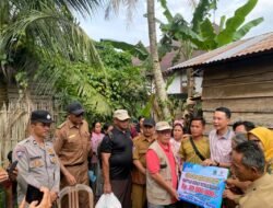 Polres Rejang Lebong Amankan Kunjungan Bupati pada Penyerahan Bantuan Bedah Rumah Baznas